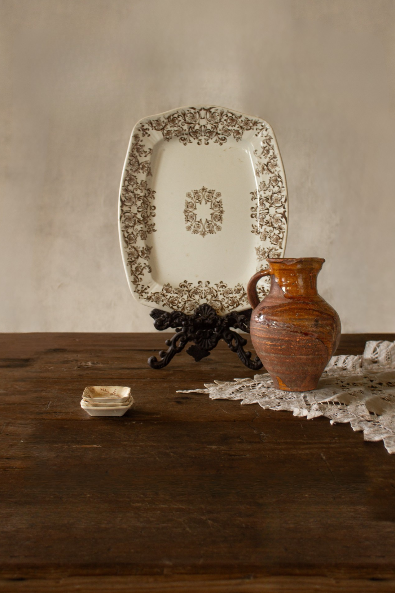 Ironstone plate with floral patterns, antique pottery pitcher