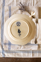 Reverse of antique Canova plate showing Cauldon England and E. Bourgeois Paris backstamps on crazed cream glaze.