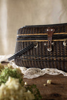 Antique English wicker fishing creel basket with leather latch, sourced in France.