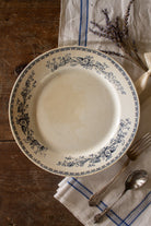 Antique French Sarreguemines Bertha blue floral transferware plate styled on rustic wood with linen and lavender.